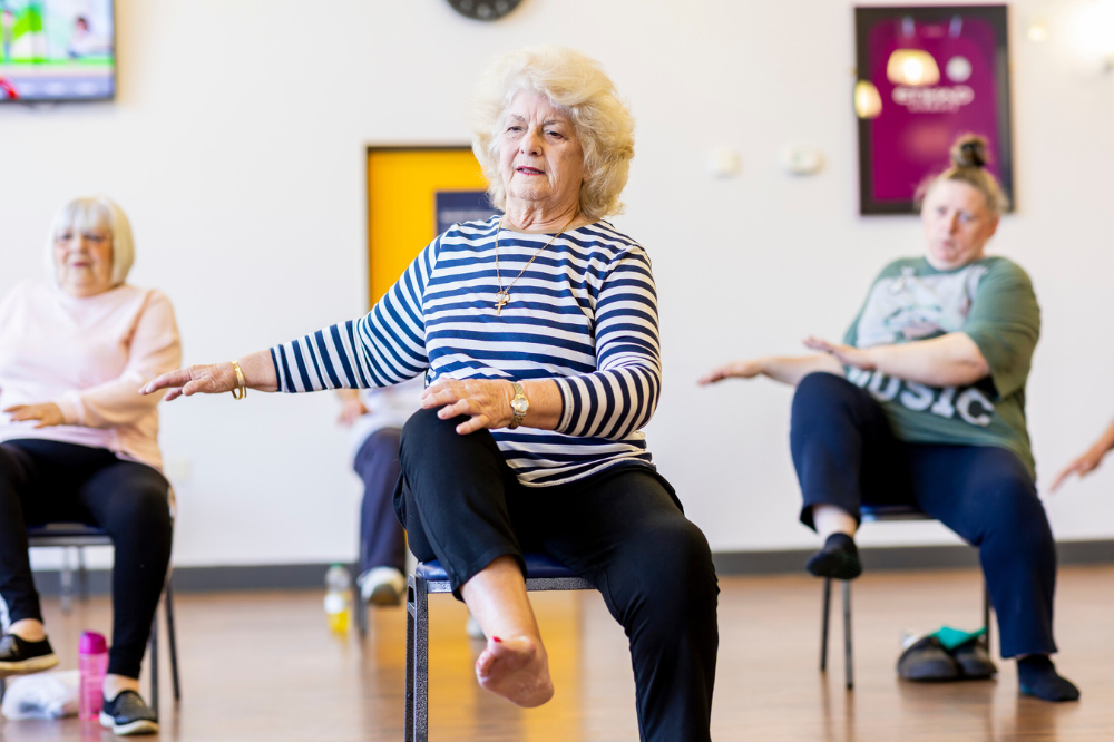 Three woman chair based exercises 