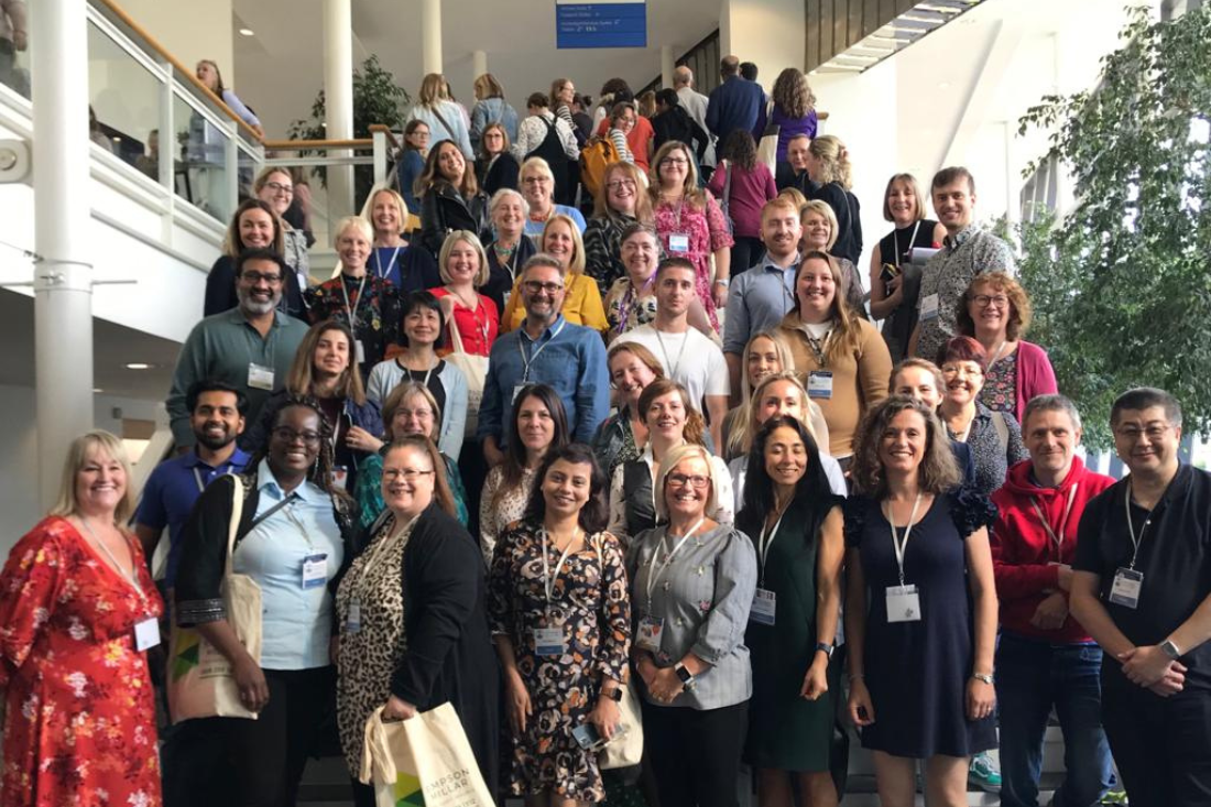 Conference attendees on stairs