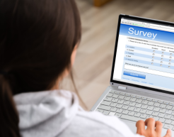 Woman filling out a survey online