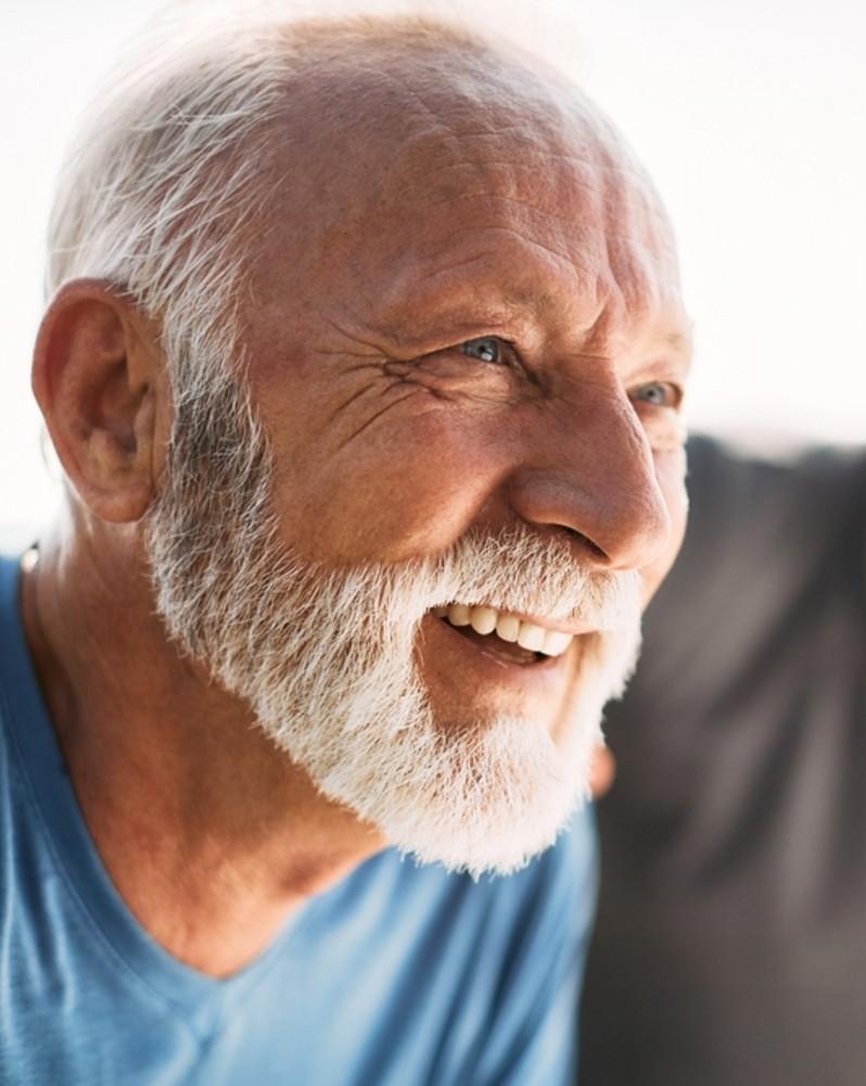 A man smiling during exercise