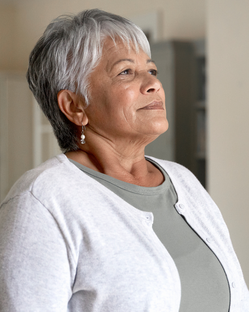 Older woman breathing in through nose